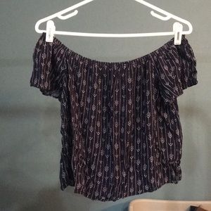 Off the shoulder shirt.